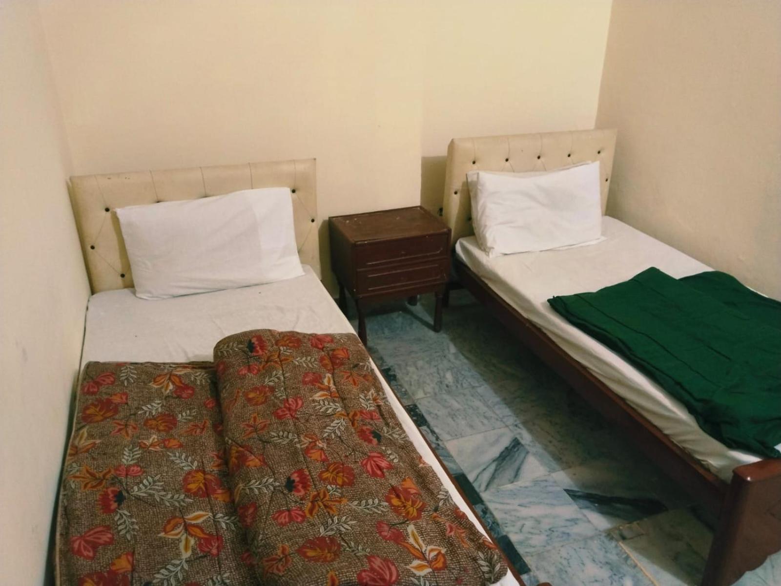 רוואלפינדי Shahzad Hotel מראה חיצוני תמונה